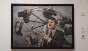 「社長の傘の下」（1996年）石田徹也　※東京藝大美術館で開催の「ＮＨＫ日曜美術館５０年展」の様子より